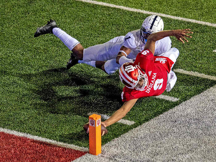 Michael Penix Jr. lunges for the game-winning two-point conversion